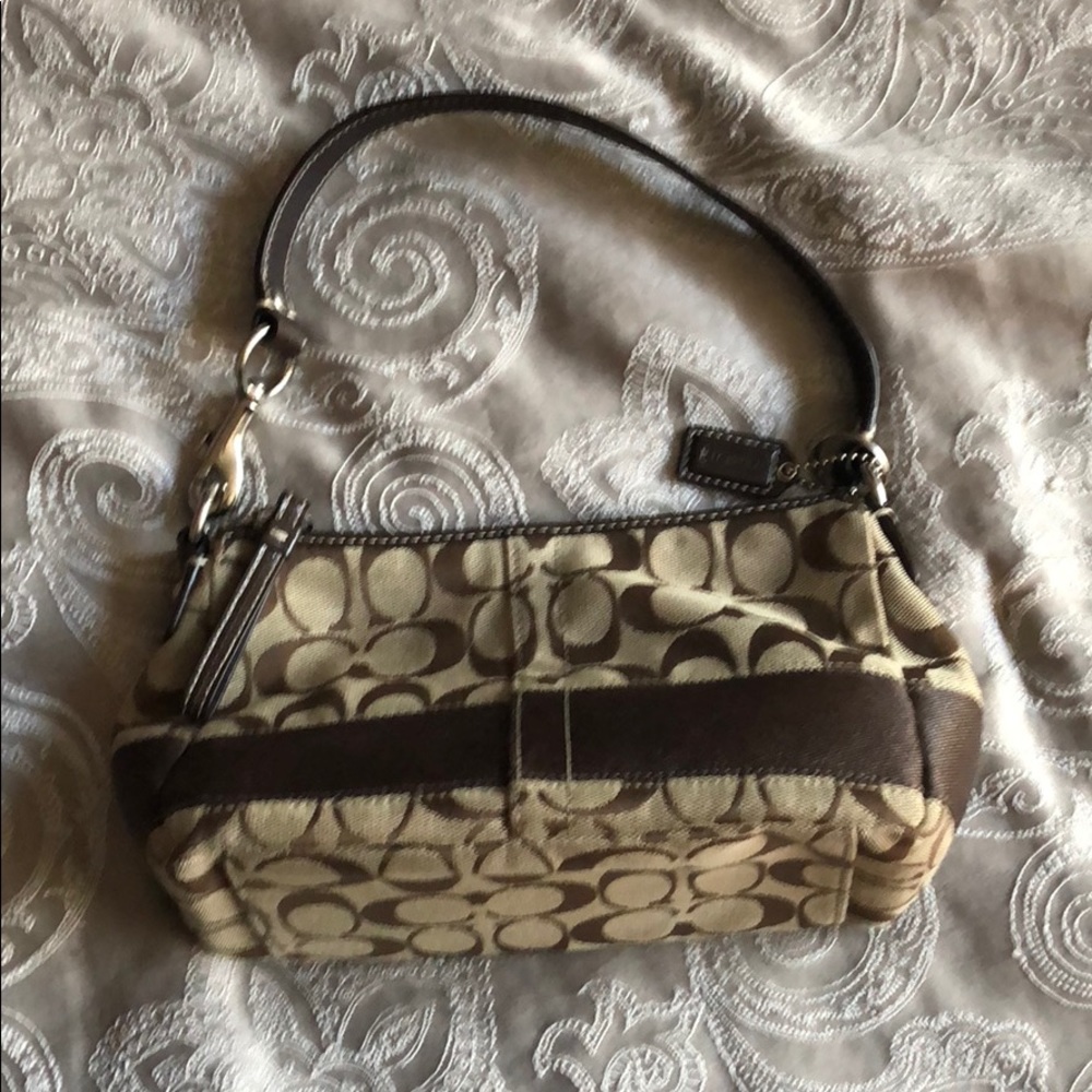 Lightly used authentic Coach small sized purse